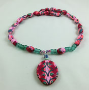 red pink green necklace